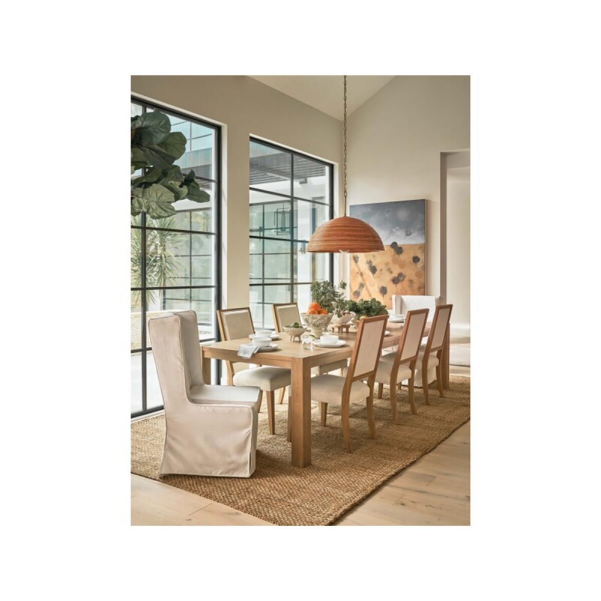 00cf5de56d8d538541e8a77961e21a9e Weekender Coastal Living Home Collection Upholstered Dining Chair - Image 1