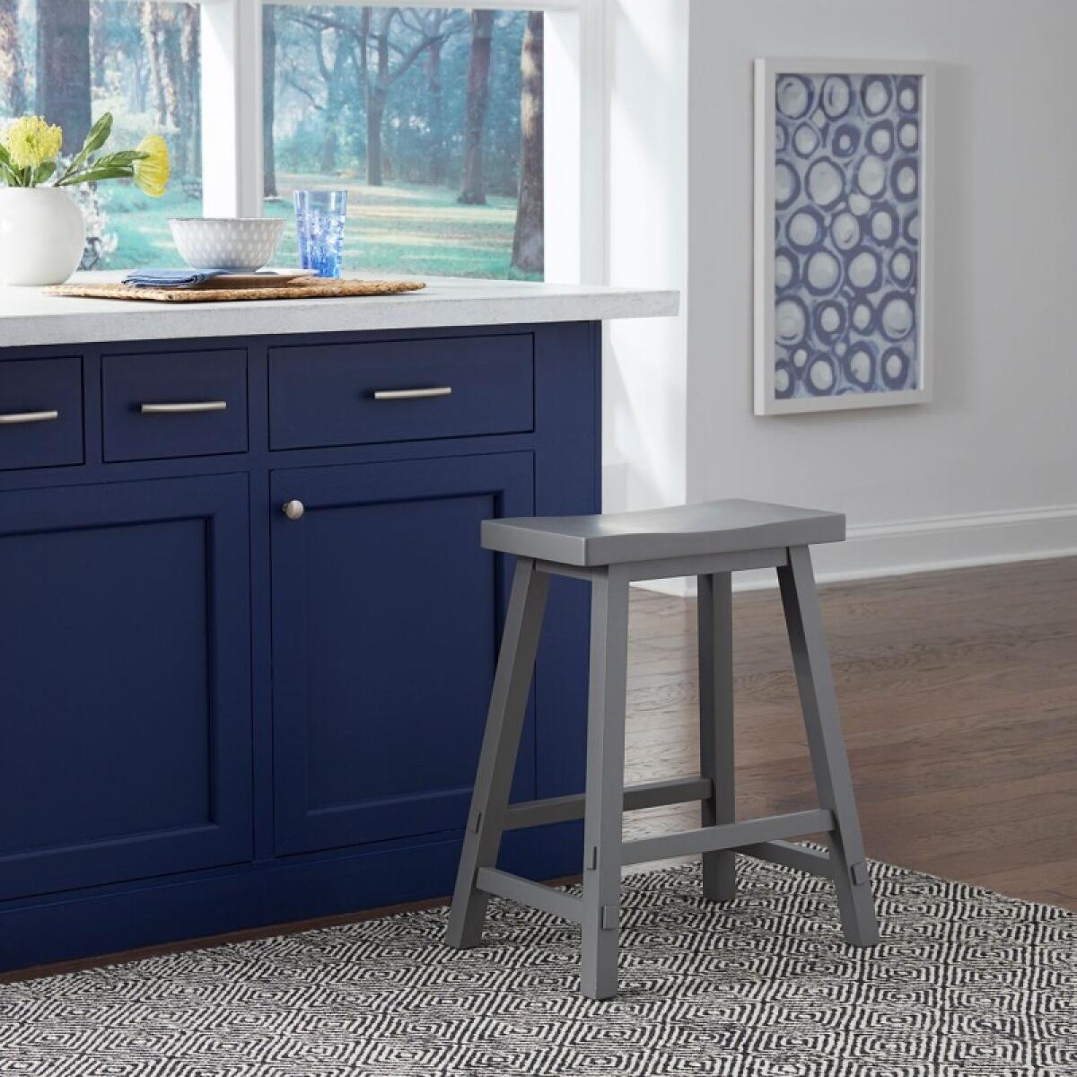 0c4d1161fe7931cbc93c30da789acda6 Creations 24 Inch Sawhorse Counter Stool- Gray - Image 1