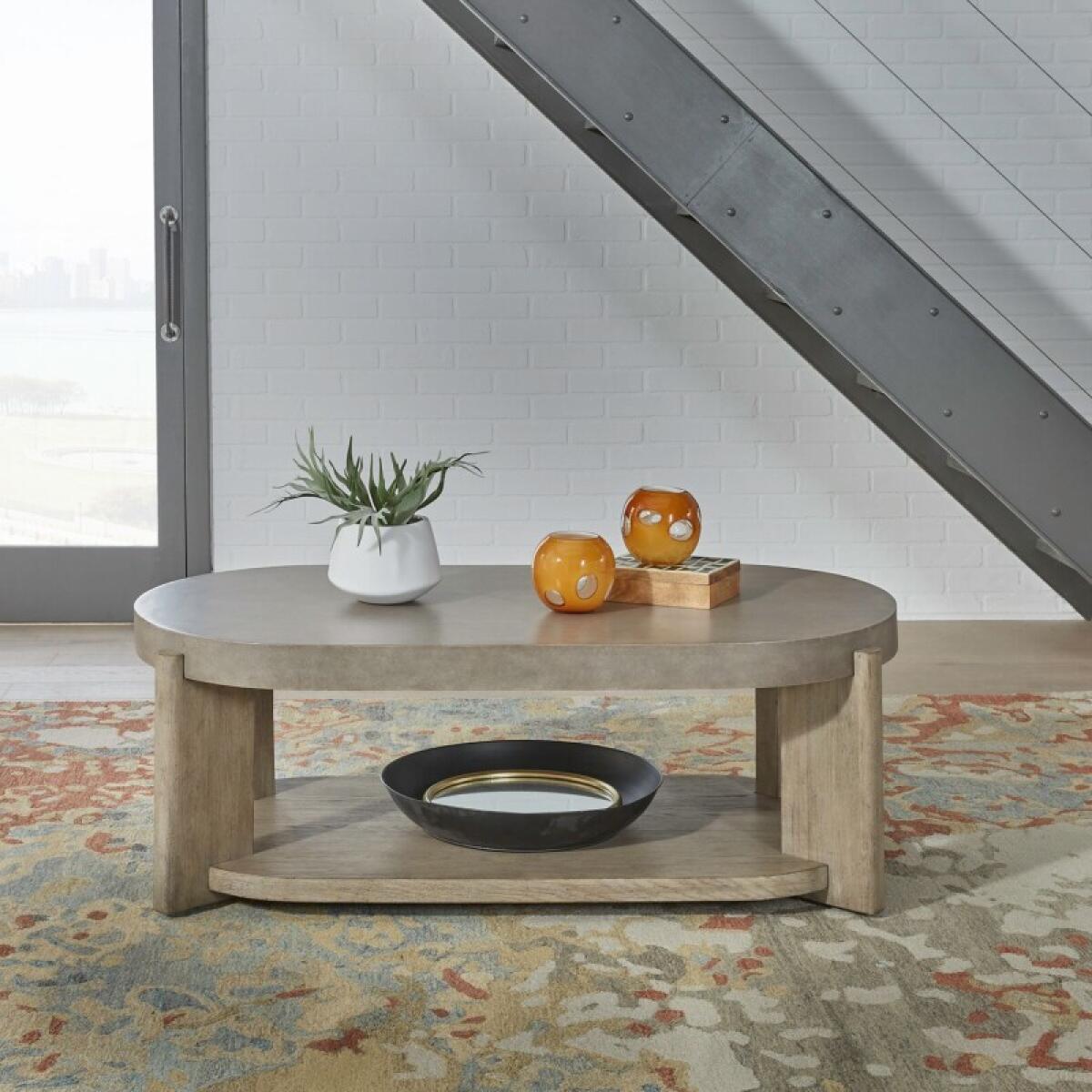 1360ce848ef9b8ea633a9e1b89f3f180 Affinity Oval Cocktail Table - Image 1