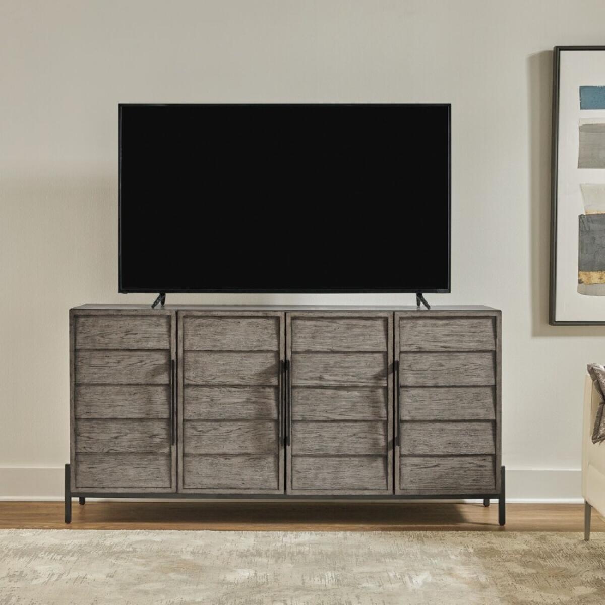 1ad145e6415a8aa7005a48a5b969559e Pelicans Buff 74 Inch Accent TV Console - Image 1