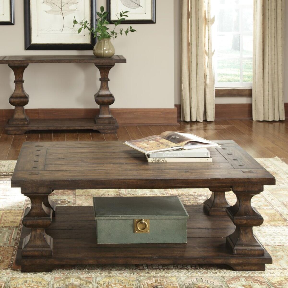 741940ff1d39b28ef77a9b702b828219 Cocktail Table - Image 1