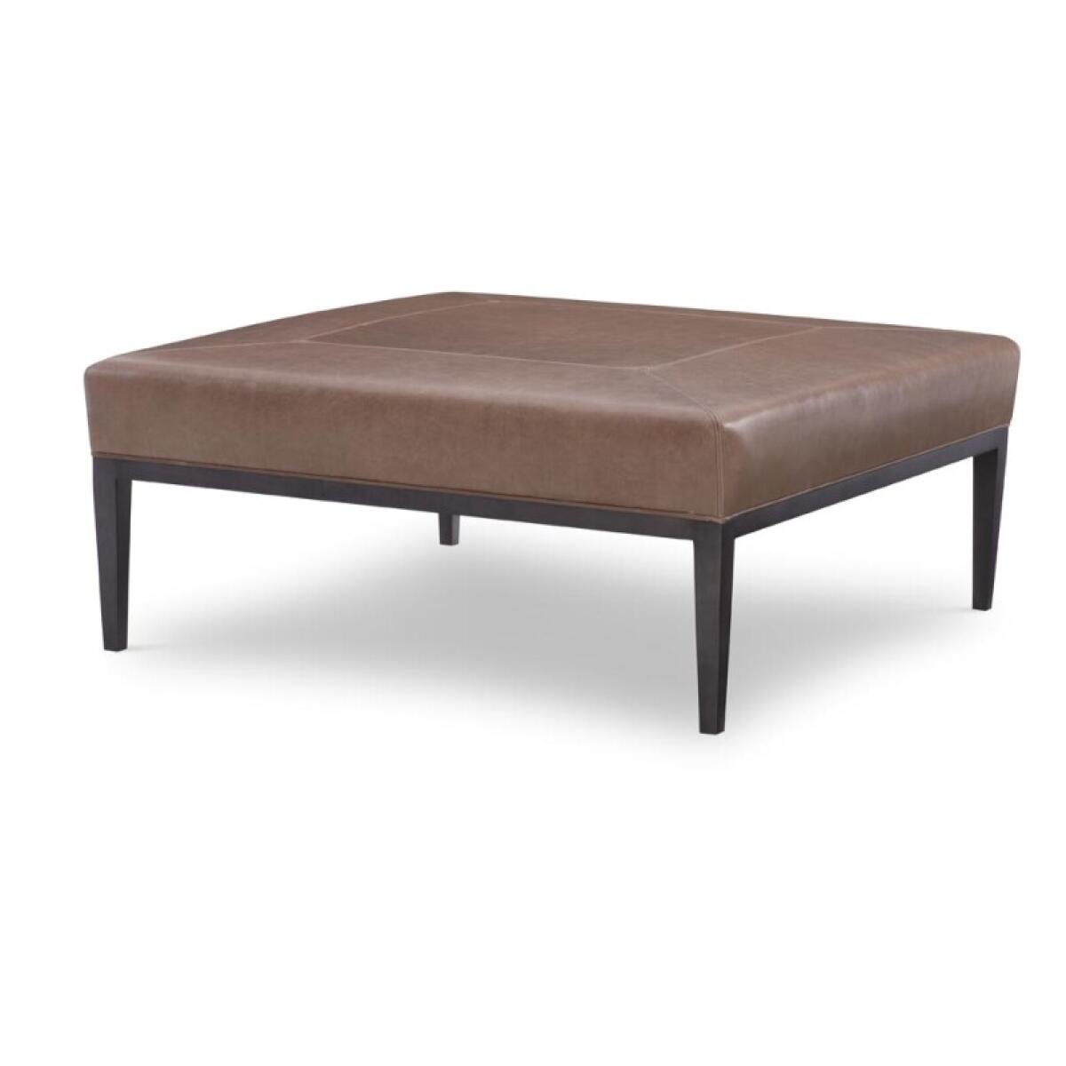 76a49e726a2616b70dca8e63680962a5 L138 Carlyle Ottoman - Image 1