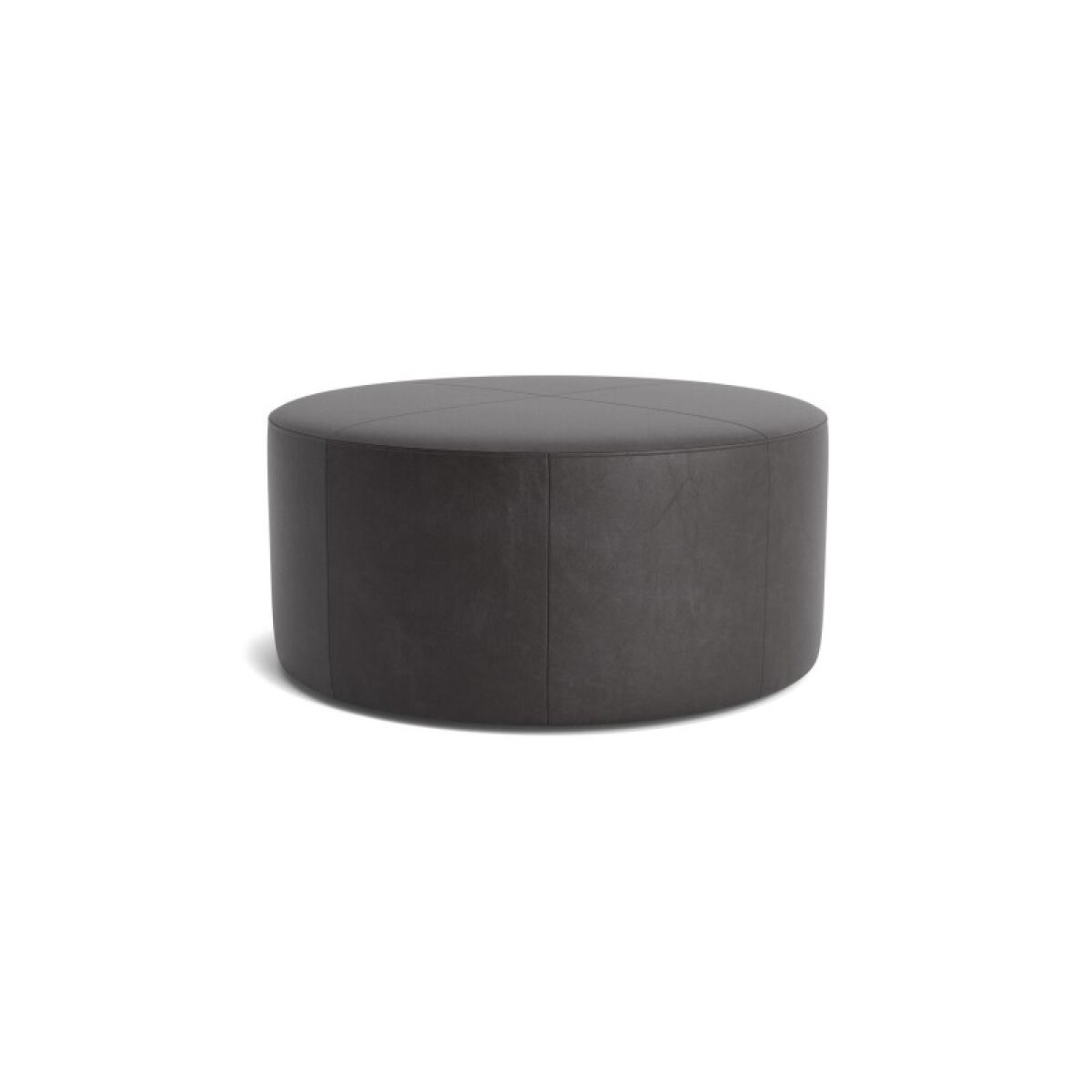 79902a6dbd624b59de4a1f659737e24e Kelly Leather Round Ottoman - Image 1
