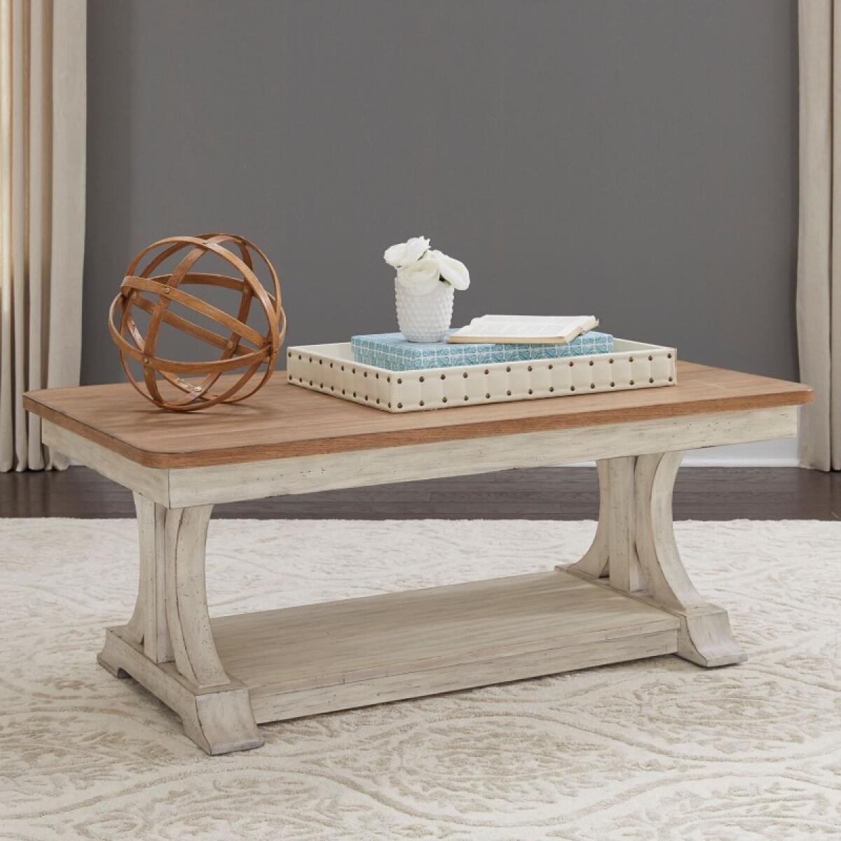 7dc7cfb54b447aeb4a70d3f106502a67 Farmhouse Reimagined Rectangular Cocktail Table - Image 1