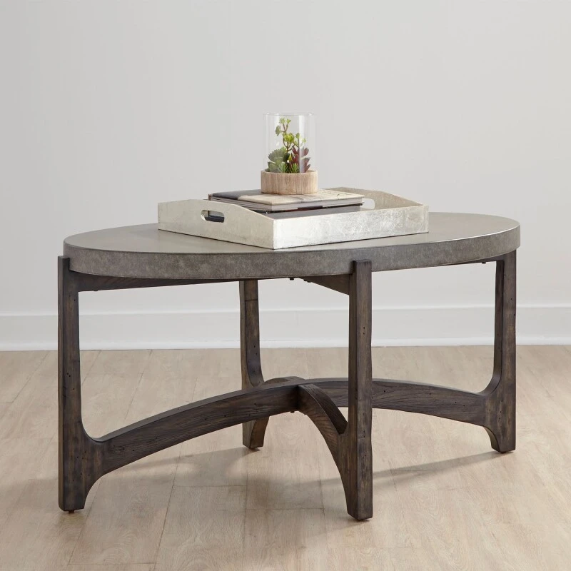 b52bcfc3d56ae6e3df90e2a0ca459ed5 Cascade Oval Cocktail Table - Image 1