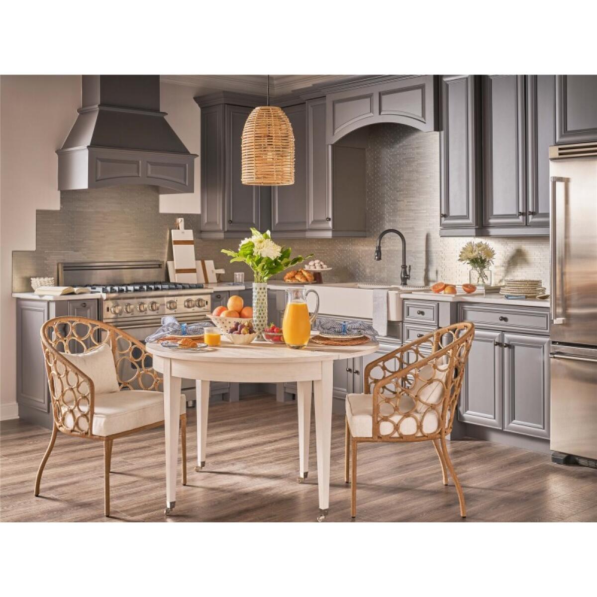 b83bd852e1f98f834f4f5f30383f7e79 Weekender Coastal Living Home Collection Pebble Dining Chair - Image 1