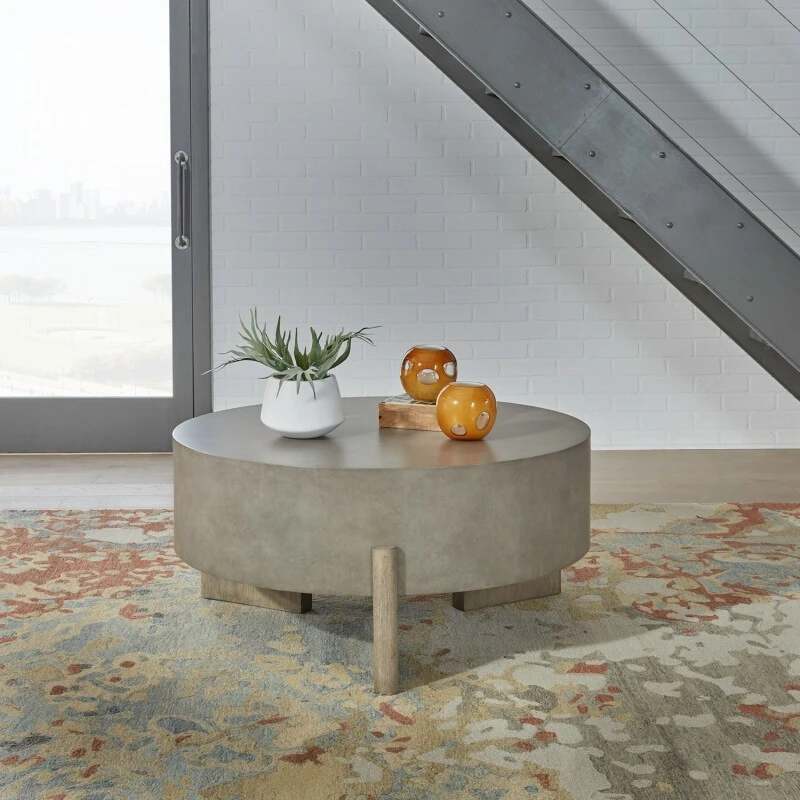 c28ffcf5fdb9def4933ae138e0fae215 Affinity Round Cocktail Table - Image 1