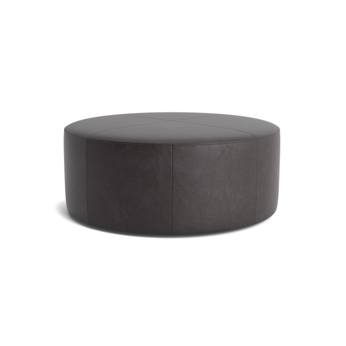 e48f991050a7341b5e68c77d5e3ac444 Kelly Leather Round Ottoman - Image 1