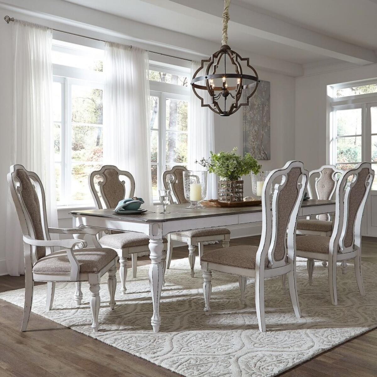 ed9cb731954c7a1ae6b8210778f76a6a Magnolia Manor 7 Piece Leg Table Set - Image 1