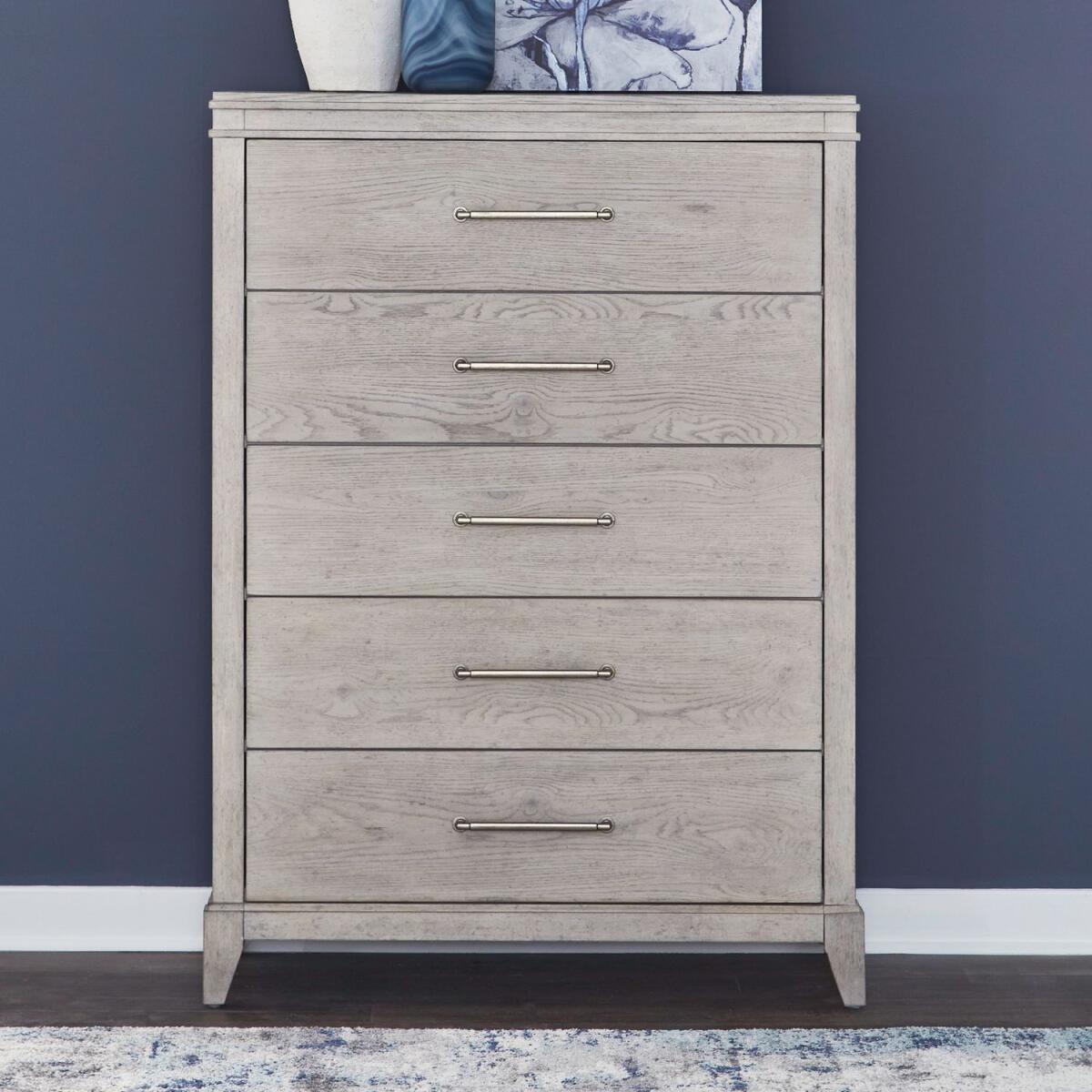 52b7efb17c80bf943468597cf6d5a821 New Haven 5 Drawer Chest - Image 1