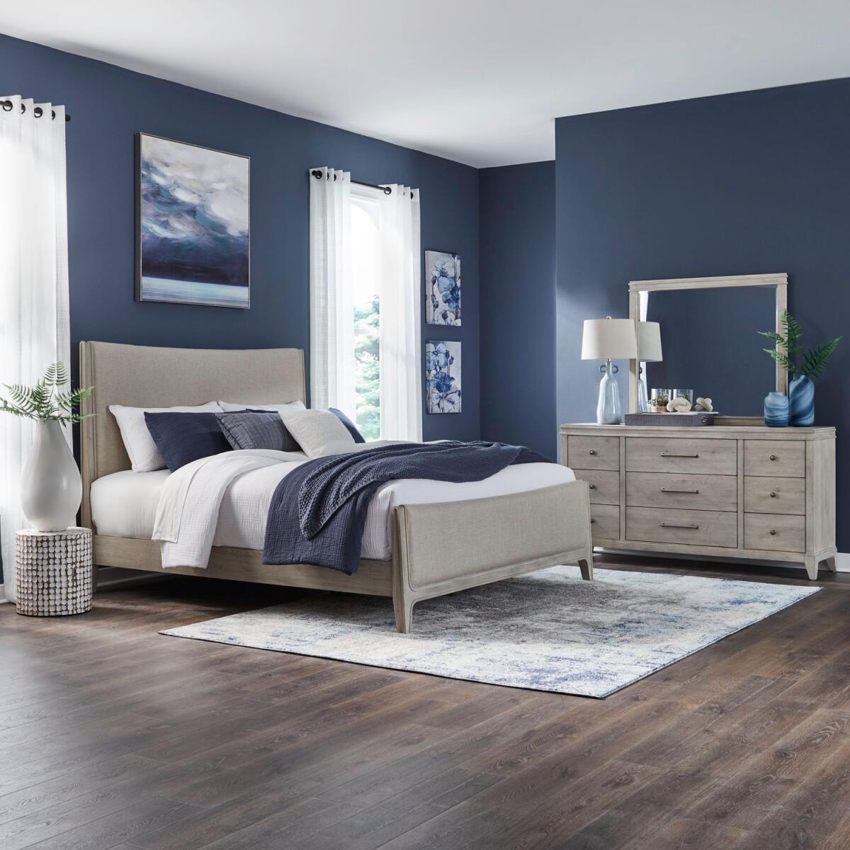 a129f1d558f90f5c0fb29d035ade88c3 New Haven Queen Uph Bed, Dresser & Mirror - Image 1