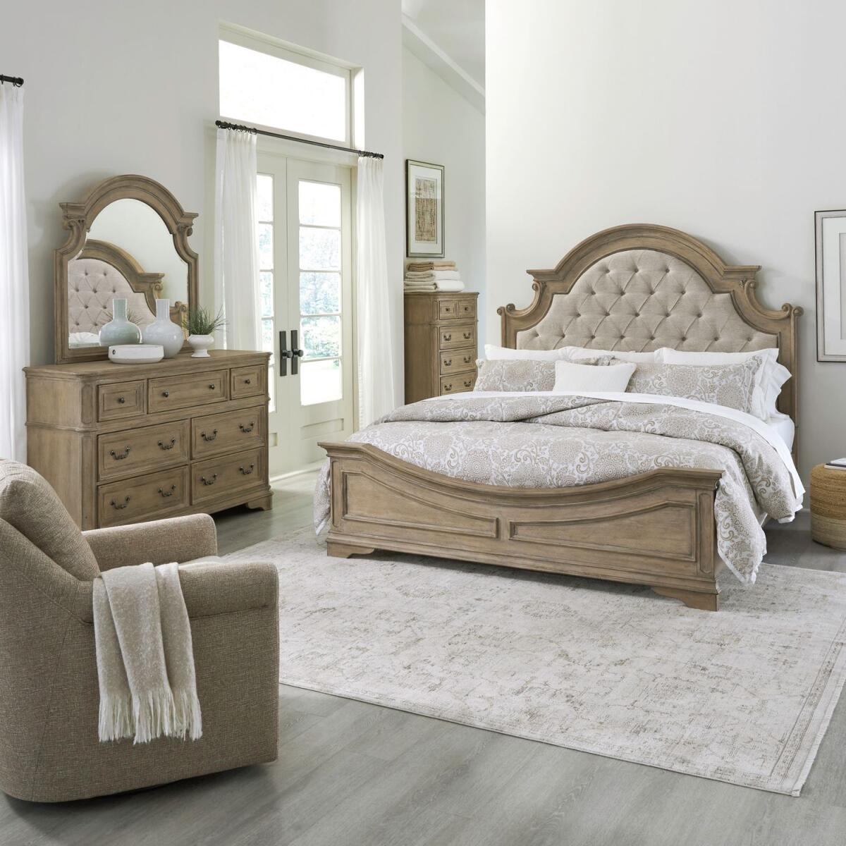 e10d4ad31935b38bcbca4544a6976d99 Magnolia Manor King California Uph Bed, Dresser & Mirror, Chest - Image 1