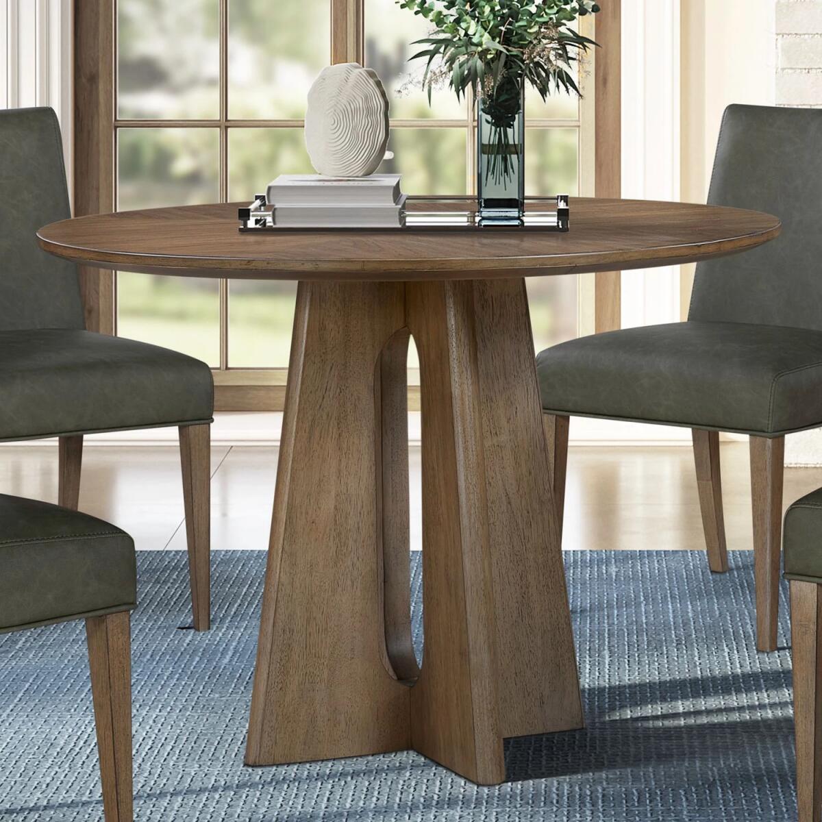 f63e025a1ced39ffb1fa4e04c04d5e77 Hendrix Place Pedestal Table Set - Image 1