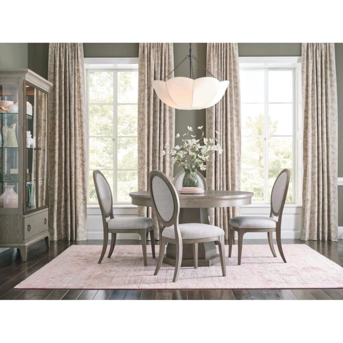 bfd10100843aafc6949ee7fa9ed313b7 Milan Hartford Round Dining Table - Complete - Image 1